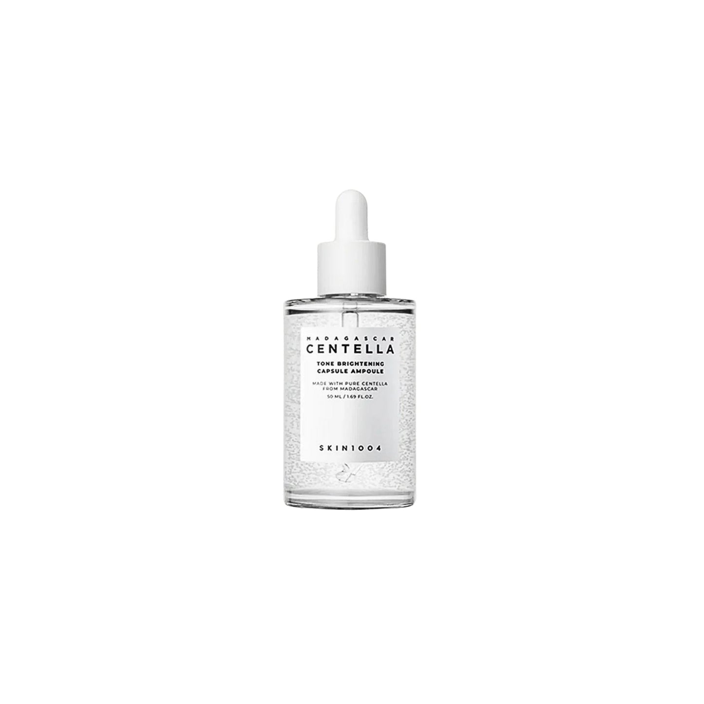 SKIN1004 Madagascar Centella tone brightening capsule ampoule bottle with a dropper for skincare application.
