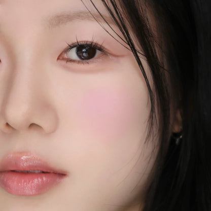 Wakemake Sheer Breeze Blusher in Mauve shade, soft pink and purple tones, smooth powder blush on a neutral background.