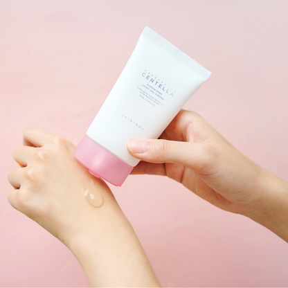 moel displaying the SKIN 1004 premizing light gel cream on the models hand 