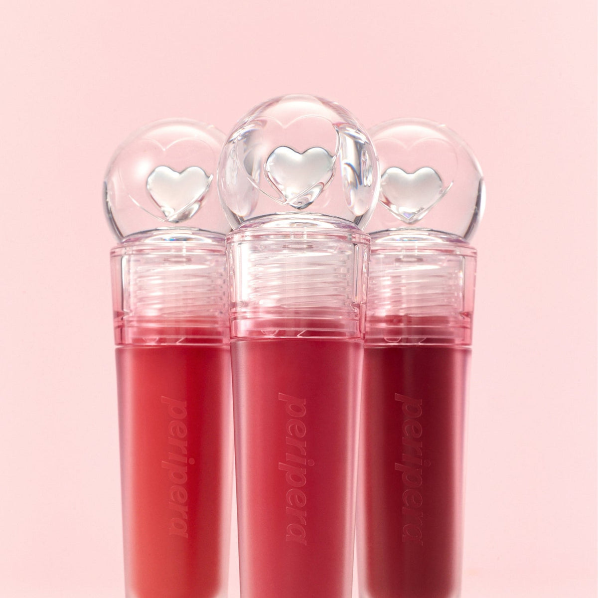 Peripera Ink Jellable Lip Tint in a vibrant shade, showing the glossy, gel-like texture and applicator tip for smooth lip color application.