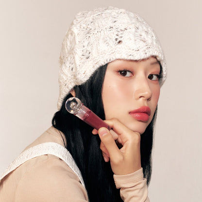 Peripera Ink Jellable Lip Tint in a vibrant shade, showing the glossy, gel-like texture of the lip tint product.