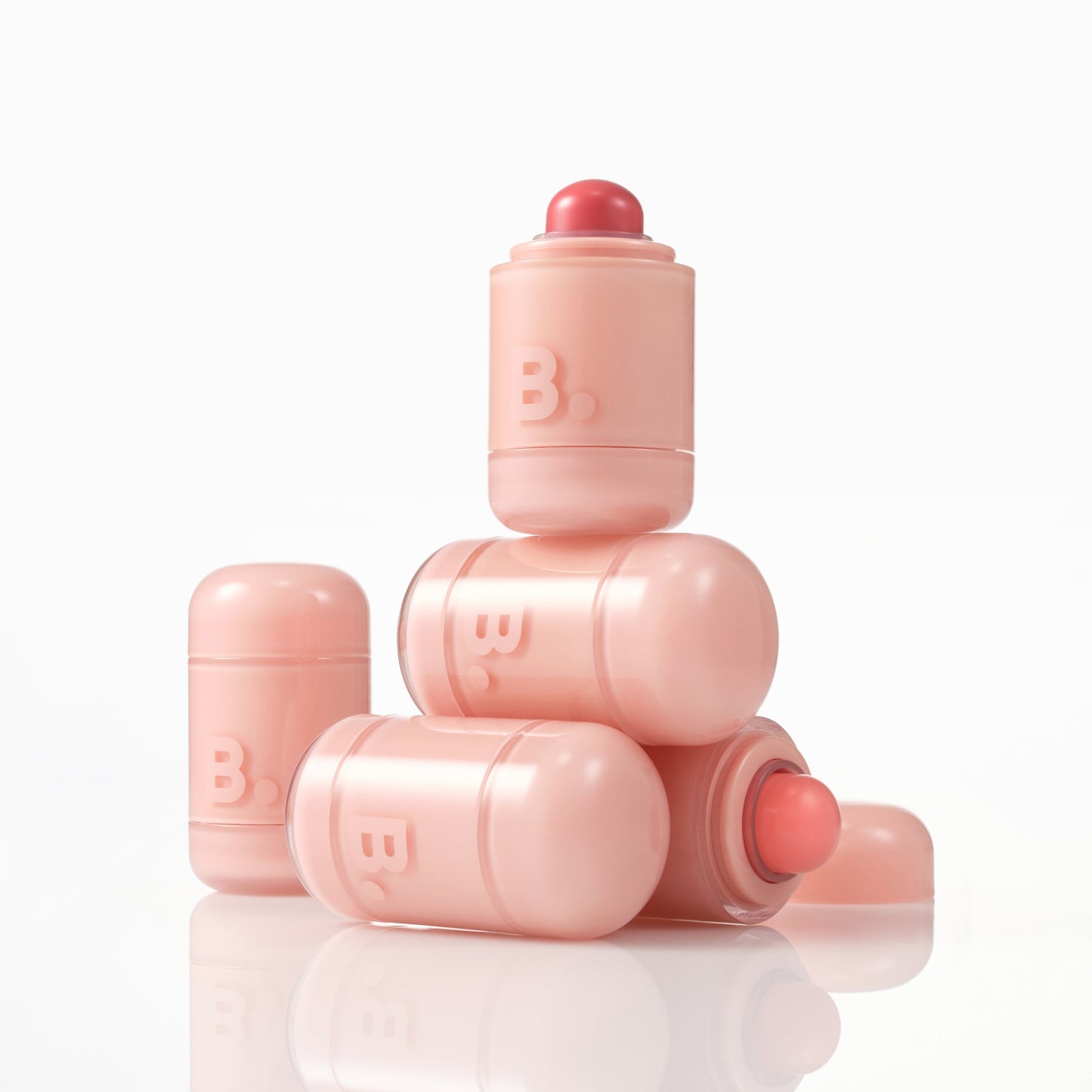 Banila Co Romantic Blush Lip & Cheek in a soft pink shade, showing the blush compact with open lid and product inside.