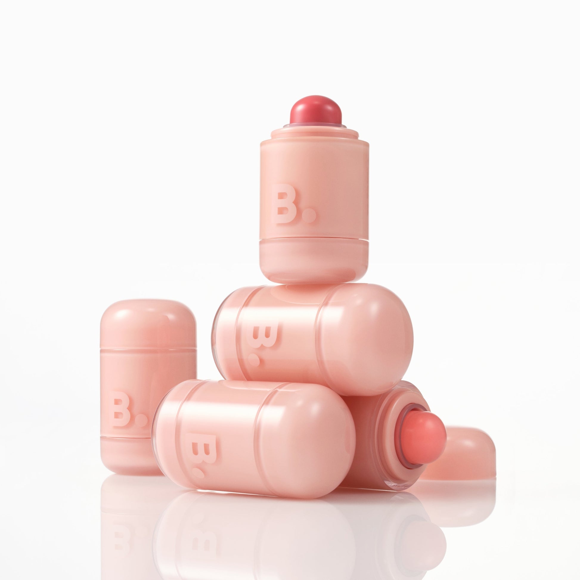 Banila Co Romantic Blush Lip & Cheek in a soft pink shade, showing the blush compact with open lid and product inside.