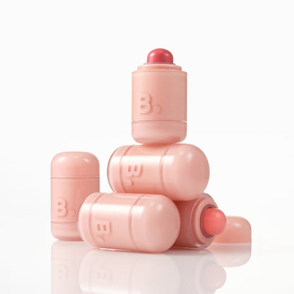 Banila Co Romantic Blush Lip & Cheek in a soft pink shade, showing the blush compact with open lid and product inside.