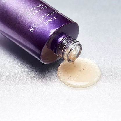 Missha Time Revolution Night Repair Ampoule 5X in a 70ml bottle, shown with a sleek packaging and glass dropper.