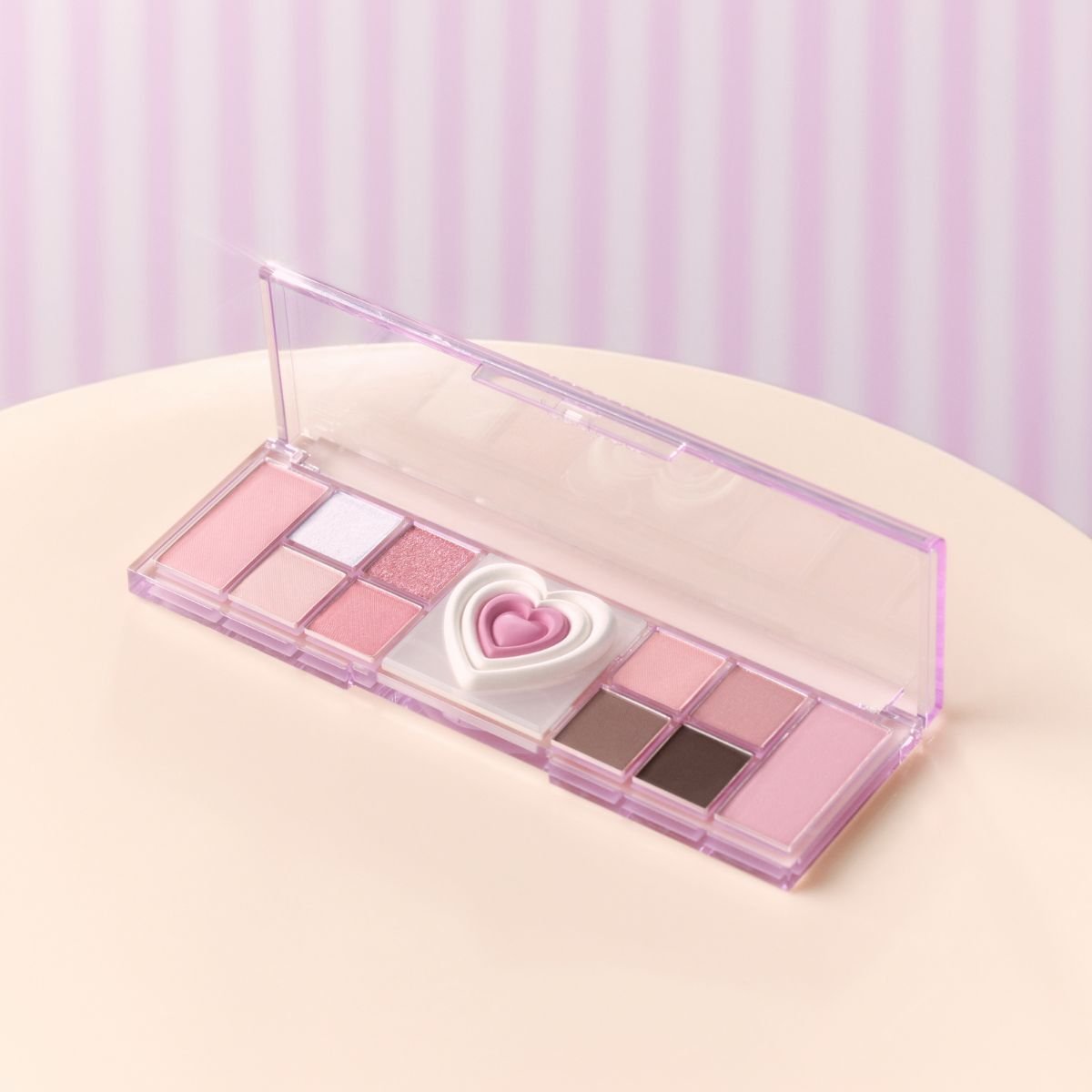 Peripera All Take Mood Like Eyeshadow Palette with colorful shades in a sleek compact, ideal for creating versatile eye looks.