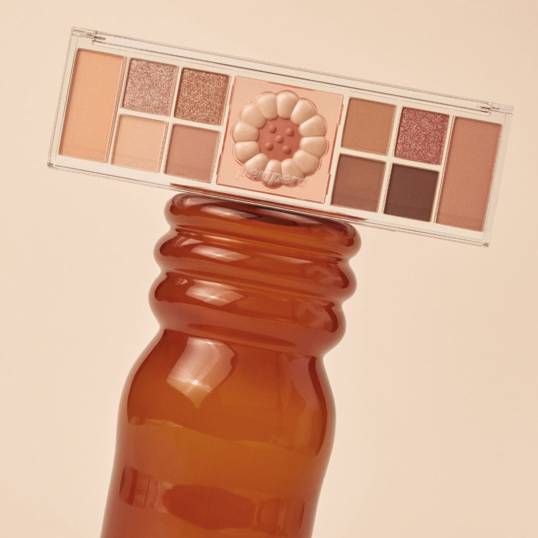Peripera All Take Mood Like Eyeshadow Palette with vibrant neutral shades in sleek packaging