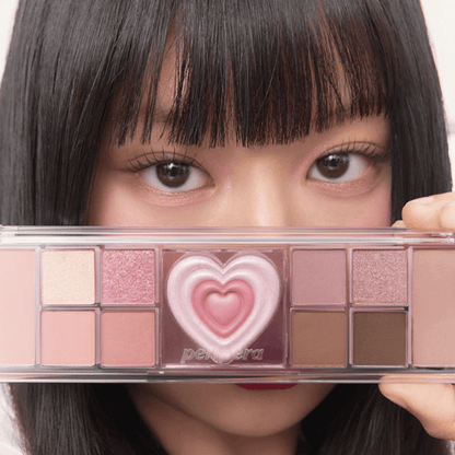 Peripera All Take Mood Like Eyeshadow Palette with multiple neutral and vibrant shades in a sleek compact.