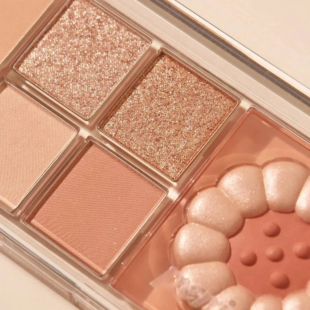 Peripera All Take Mood Like Palette eyeshadow palette with colorful shades in a sleek compact.