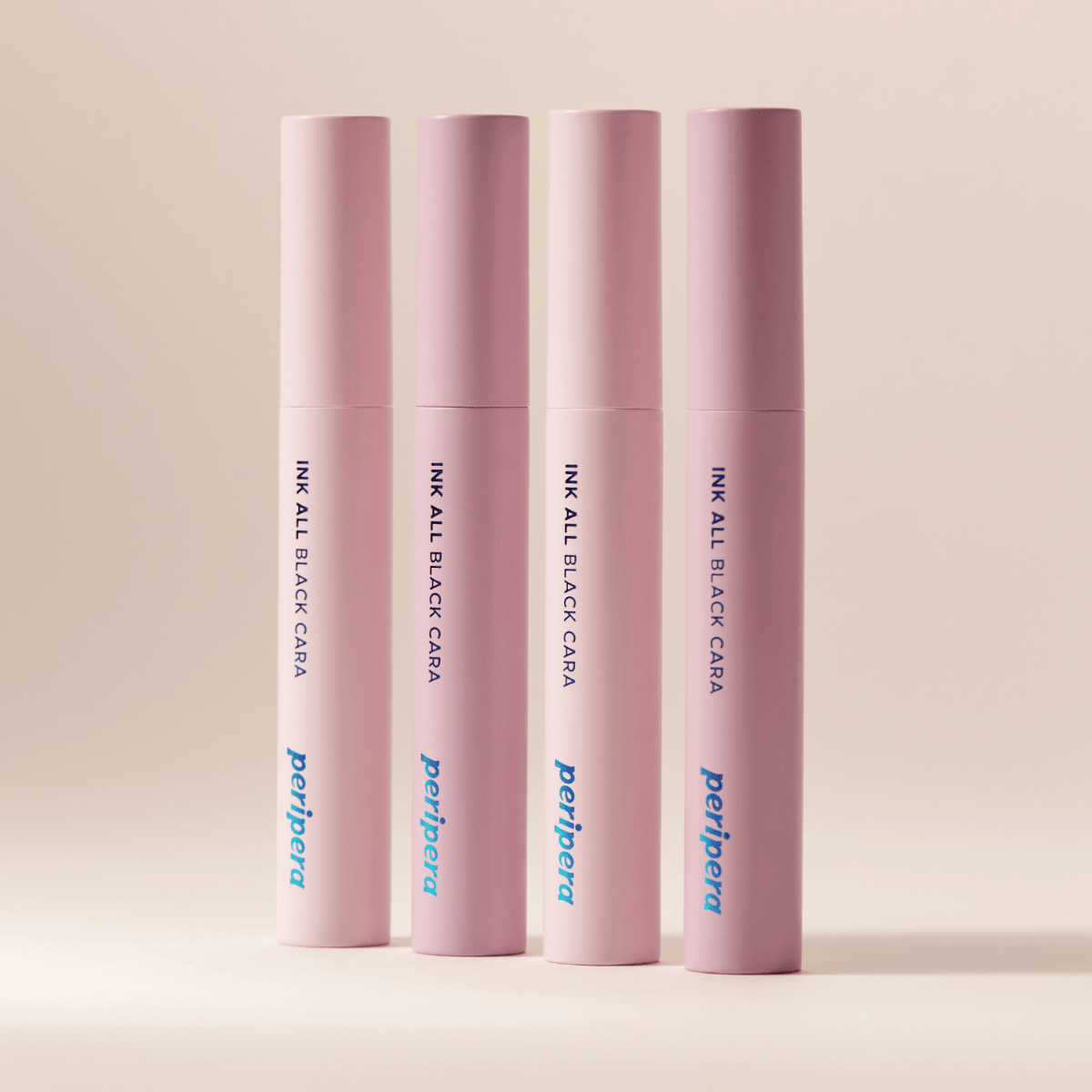 Peripera Ink All Black Cara mascara wand showing densely packed black mascara brush with smooth bristles.