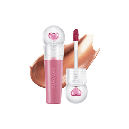 Peripera Ink Jellable Lip Tint in vibrant pink, showcasing glossy, gel-like texture on lips.