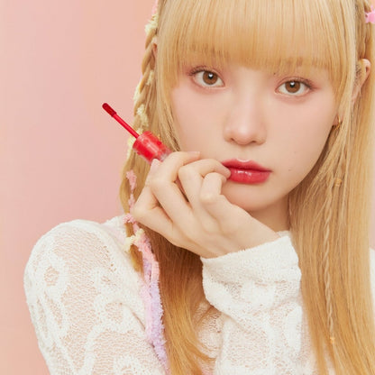 Peripera Ink Mood Glowy Tint in Soft Berry, a lip tint with a glossy finish and rich berry color.