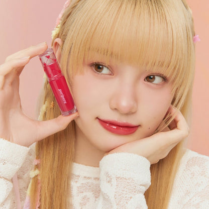 Peripera Ink Mood Glowy Tint in Soft Berry, a lip tint with a glossy finish and rich berry color, shown in a close-up shot.