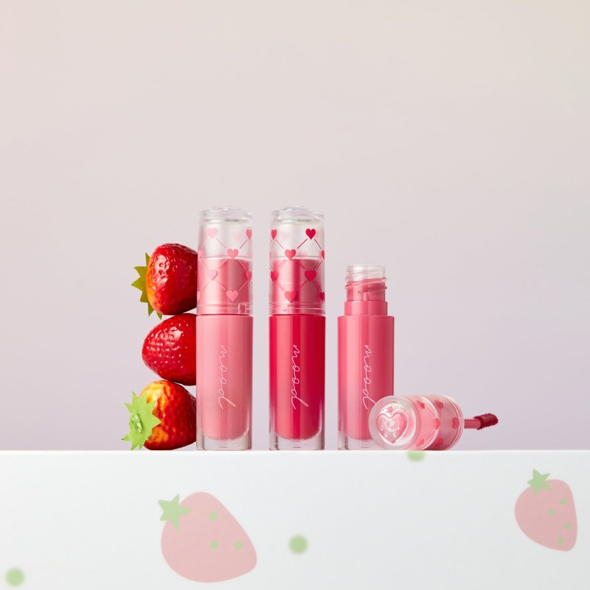 Peripera Ink Mood Glowy Tint in Soft Berry, a lip tint with a glossy finish and rich berry color, shown on lips.