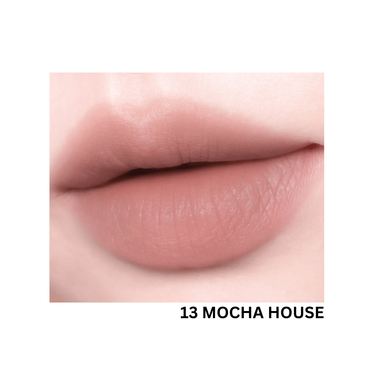 Peripera Over Blur Tint lip tint in a soft, natural shade, showcasing the product tube with the applicator visible.