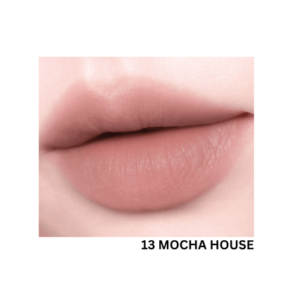 Peripera Over Blur Tint lip tint in a soft, natural shade, showcasing the product tube with the applicator visible.