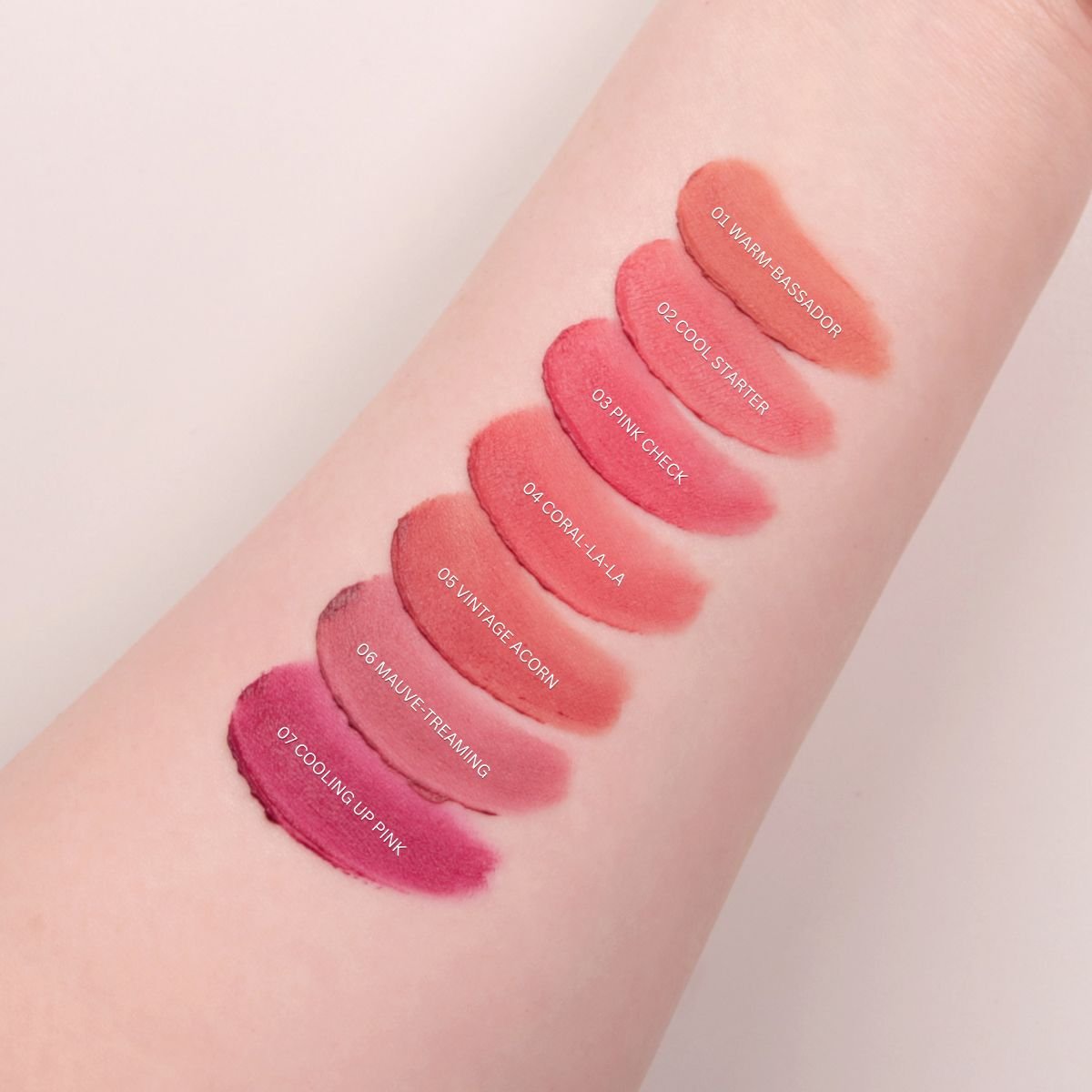 Peripera Over Blur Tint lip tint in a soft, natural shade, showing the smooth applicator and vibrant color on lips.