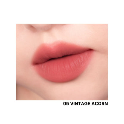 Peripera Over Blur Tint lip tint applied on lips showcasing smooth, blurred color for a natural, soft finish.
