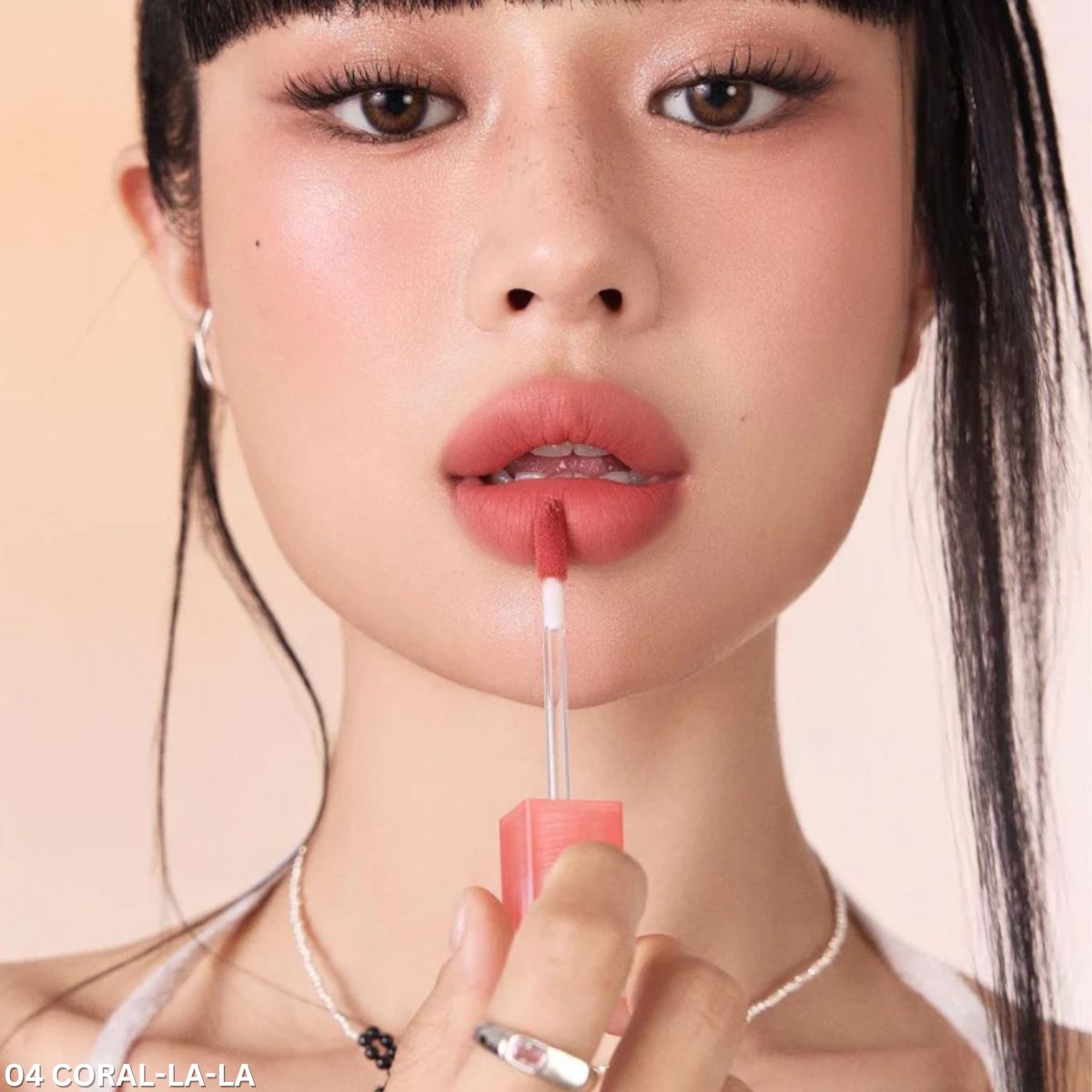 Peripera Over Blur Lip Tint in shade 5897996 showing the smooth, blurred lip color application on lips.