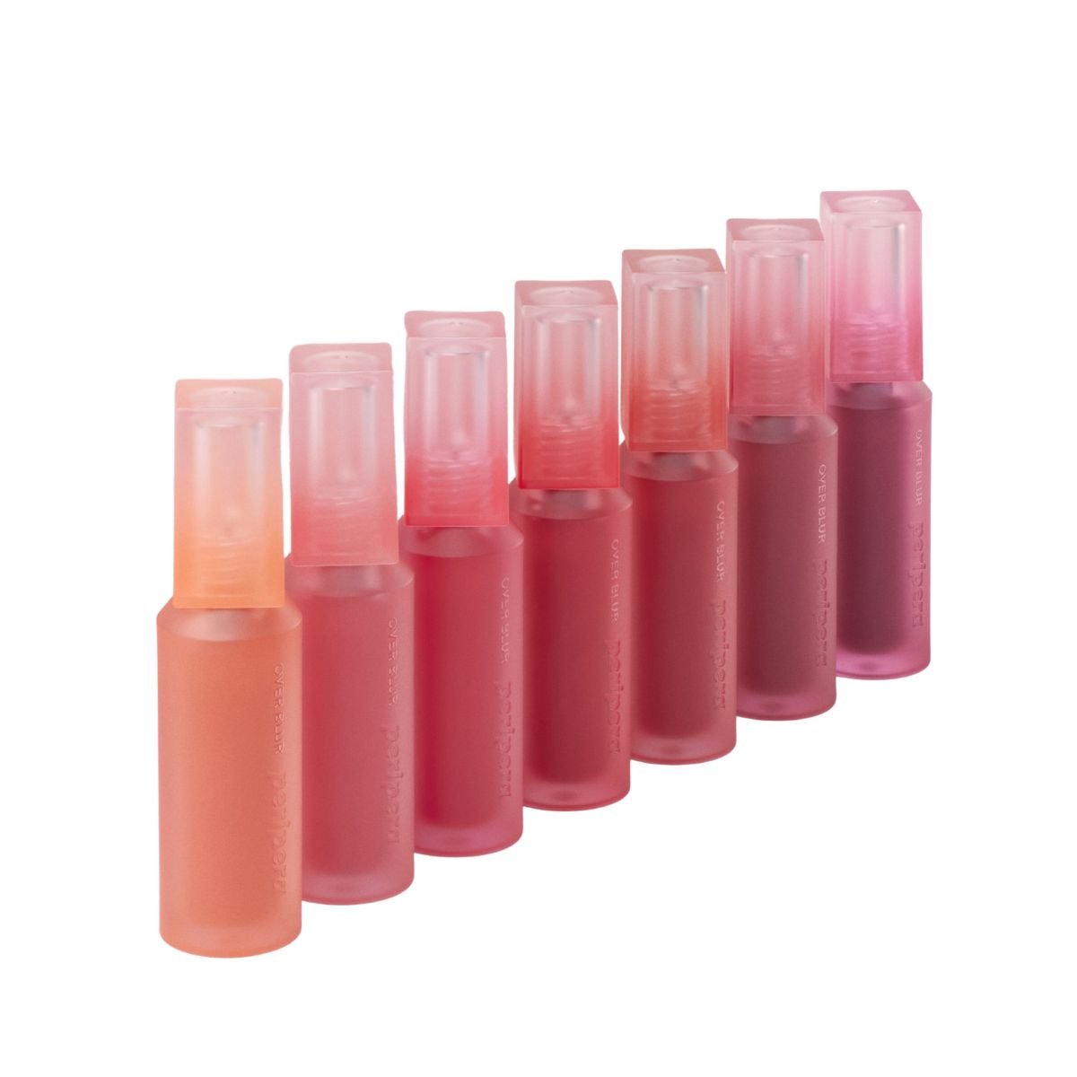 Peripera Over Blur Lip Tint in a soft pink shade, showcasing smooth application and glossy finish on lips.