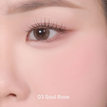Peripera Pure Blushed Custom Cheek blush compact with soft pink shade and natural finish on a beige background.