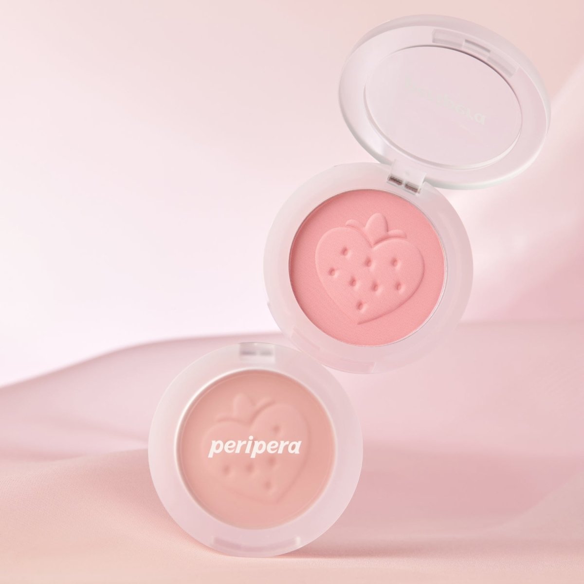 Peripera Pure Blushed Sunshine Cheek blush in Soft Berry shade, showing a compact blush with a soft pink and berry hue.