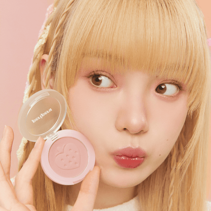 Peripera Pure Blushed Sunshine Cheek in Soft Berry, a blush compact with pink and berry shades, showing the product's color and packaging.