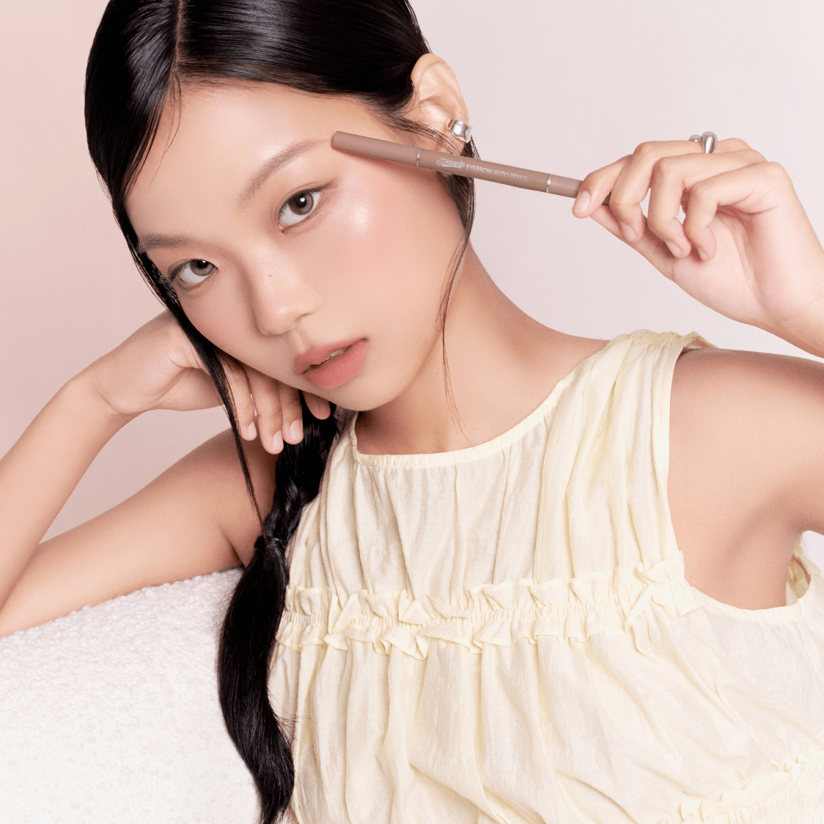 Peripera Speedy Eyebrow Auto Pencil showing the slim pencil and cap for precise eyebrow shaping and filling.