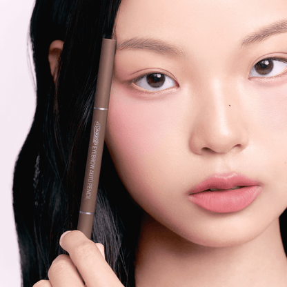 Peripera Speedy Eyebrow Auto Pencil for defining and filling in eyebrows with precise, natural-looking strokes.